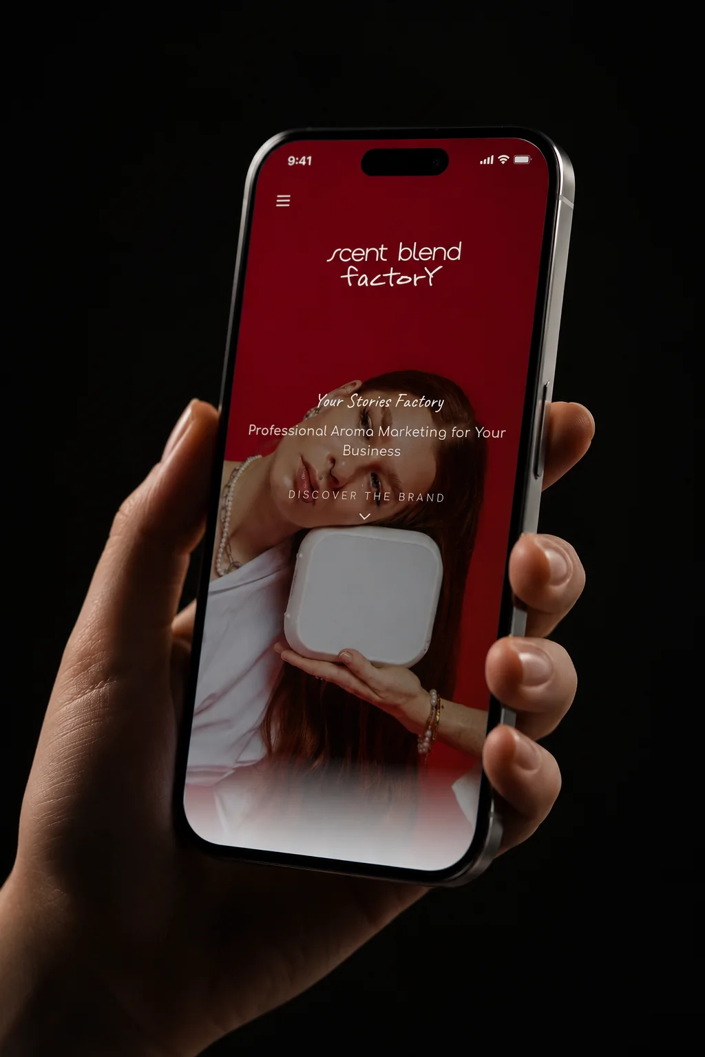 The scent-blend.com storefront open on a phone held in one hand